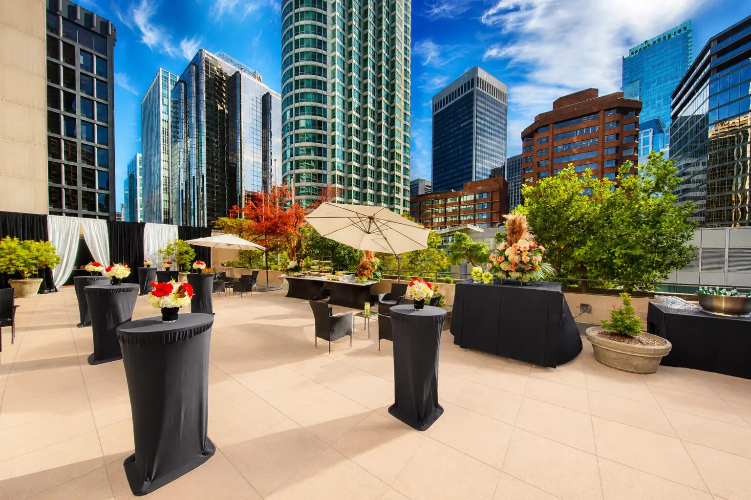 Outdoor terrace reception with Vancouver skyline views at Pinnacle Hotel Harbourfront