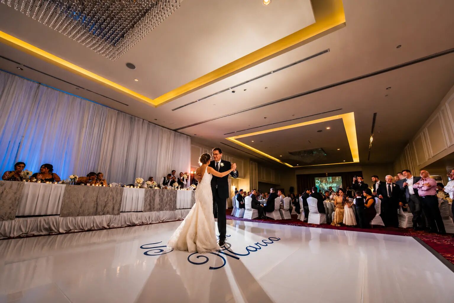 Couple sharing their first dance in the Harbourfront Ballroom